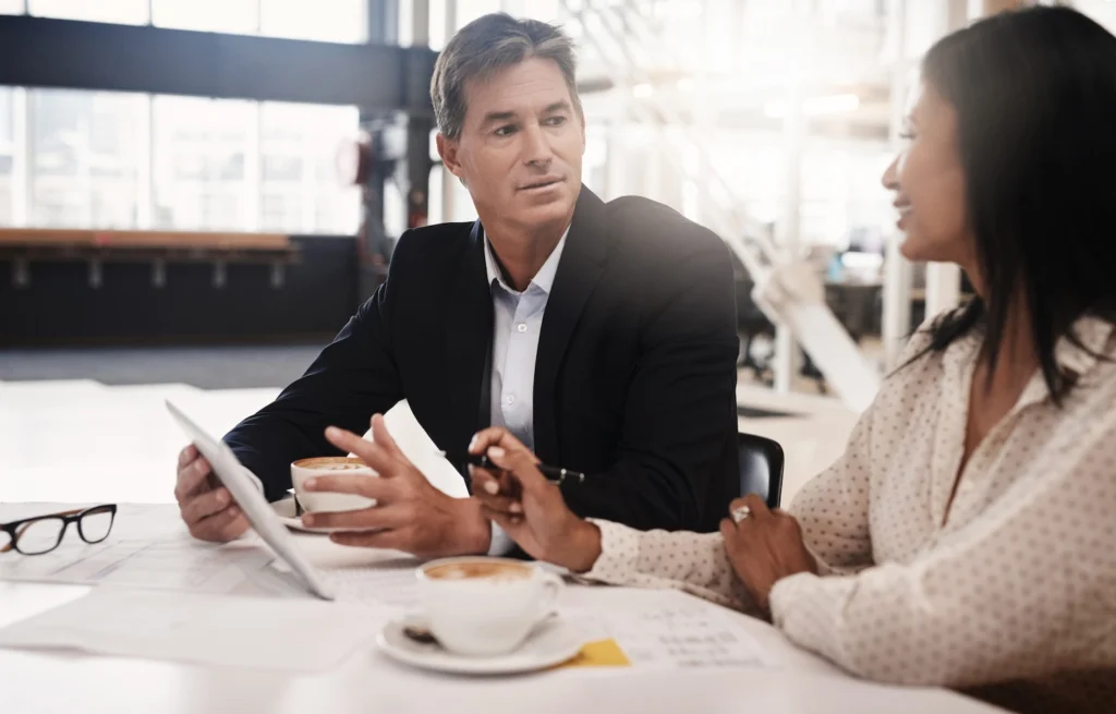 Financial advisor guiding high-net-worth client on tax strategies.